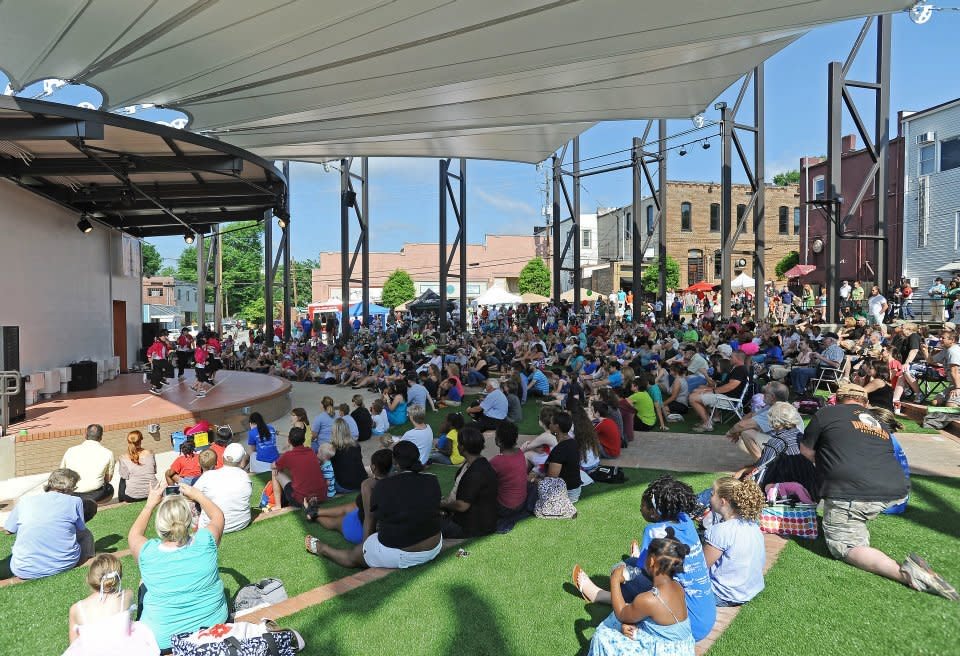 people gathered to watch a performance at the amp in carrollton, GA