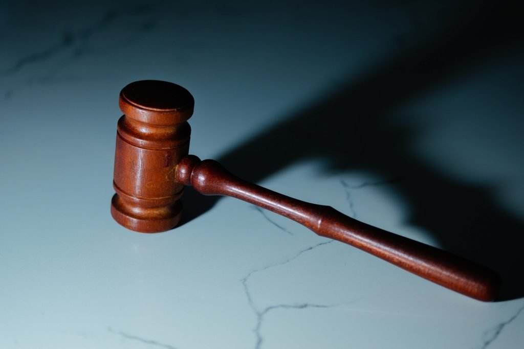 dark picture of gavel resting on marble counter representing a judges rulings with regards to the statute of limitations.